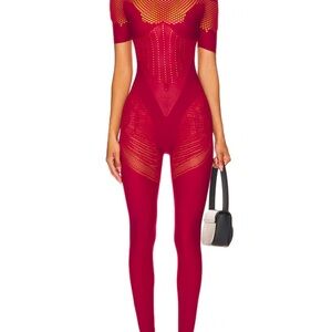 Vivian Jumpsuit in Red
Poster Girl